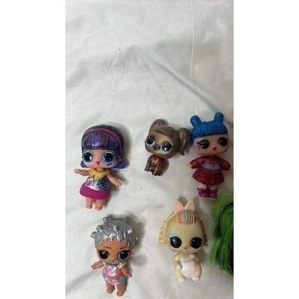Set Of Nine LOL Surprise Dolls.